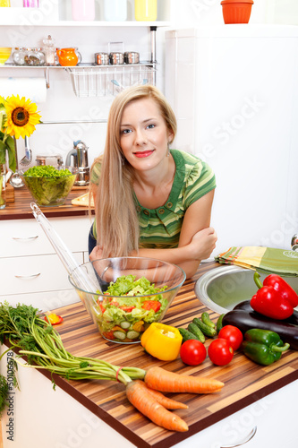 Photo: Beautiful woman in the kitchen Beautiful woman in the kitchen