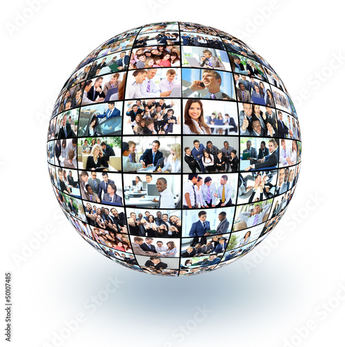 Photo: A globe i with many different business people A globe i with many different business people