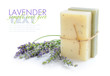 Handmade soap and lavender flowers on a white background