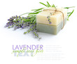 Handmade soap and lavender flowers on a white background