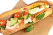 Photo: Sandwich with smoked chicken on a white background. Sandwich with smoked chicken on a white background.
