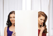 two women with blank board