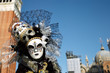 Venetian costume attends Carnival of Venice.