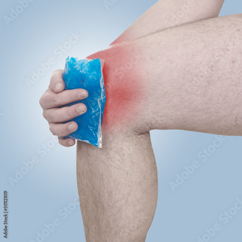 Photo: Cool gel pack on a swollen hurting knee. Cool gel pack on a swollen hurting knee.