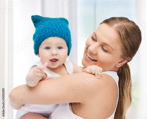 Photo: happy mother with adorable baby happy mother with adorable baby