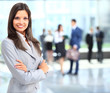 Business woman portrait smiling in an office