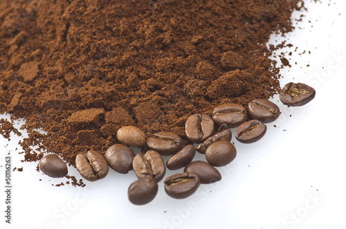 Photo: coffee powder close up on the white background coffee powder close up on the white background