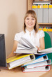 woman reading  documents  in office