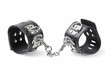 black leather handcuffs isolated on white background