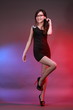 Sexy woman in various fun poses with colourful background.