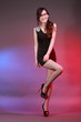 Sexy woman in various fun poses with colourful background.