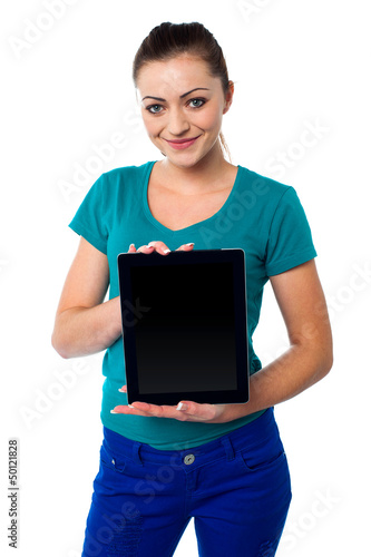 Photo: Cute model showing newly launched tablet pc Cute model showing newly launched tablet pc