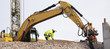 bulldozer and building workers in action