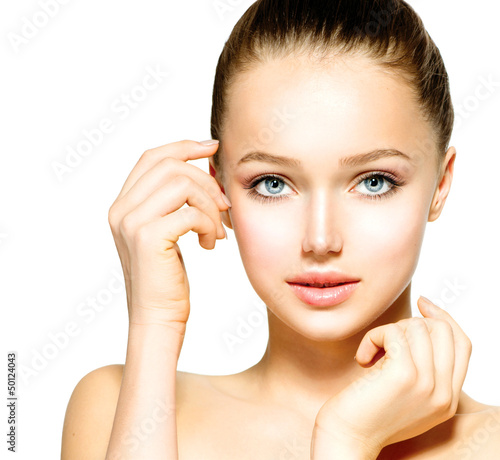 Photo: Beauty Teenage Girl Portrait isolated on a White Background Beauty Teenage Girl Portrait isolated on a White Background