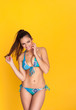 Photo: Woman in blue bikini Woman in blue bikini