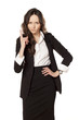 frowning and angry business woman pointing a finger upwards