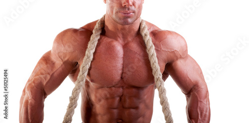 Photo: bodybuilder posing with rope bodybuilder posing with rope