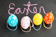 Foto: Colorful Easter egg shaped candles and text Colorful Easter egg shaped candles and text