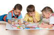 Little boys drawing on paper