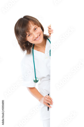 Photo: female doctor showing blank board smiling female doctor showing blank board smiling