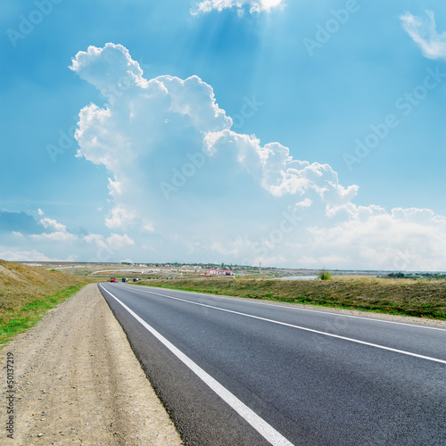 Photo: asphalt road to cloudy horizon asphalt road to cloudy horizon