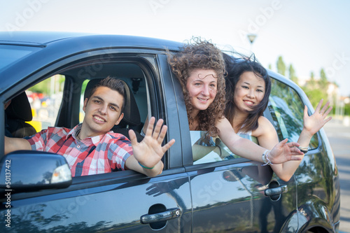 Photo: Boys and Girls in a Car Leaving for Vacation Boys and Girls in a Car Leaving for Vacation