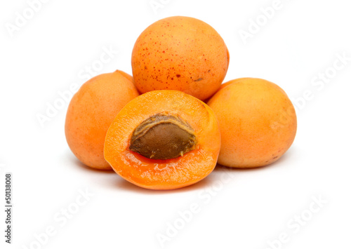 Photo: ripe apricots on a white background ripe apricots on a white background