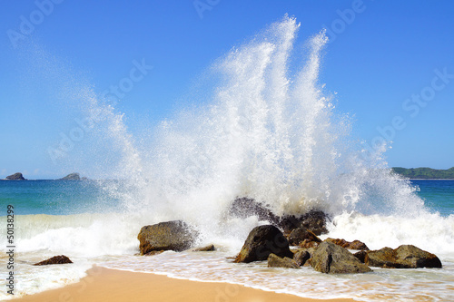 Photo: Big wave crashes on to the shore. Nacpan Beach. El Nido Big wave crashes on to the shore. Nacpan Beach. El Nido