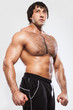 Photo: Muscular young man with naked torso Muscular young man with naked torso