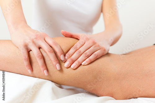 Photo: Patient at the physiotherapy - massage Patient at the physiotherapy - massage