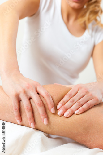 Photo: Patient at the physiotherapy - massage Patient at the physiotherapy - massage