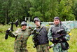 Photo: Paintball players in full gear at the shooting range Paintball players in full gear at the shooting range