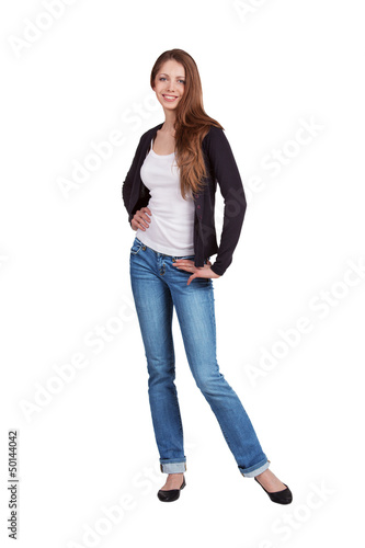 Photo: Stylish young woman in jeans Stylish young woman in jeans