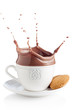 Splash of chocolate in white cup