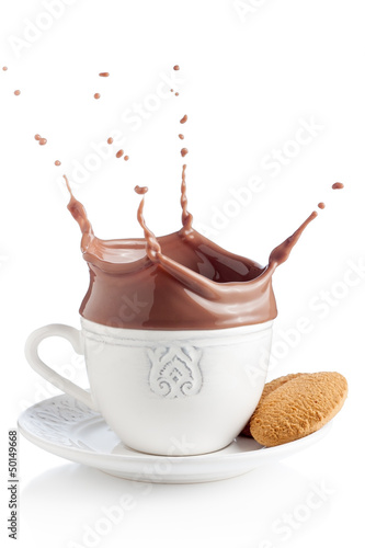 Photo: Splash of chocolate in white cup Splash of chocolate in white cup