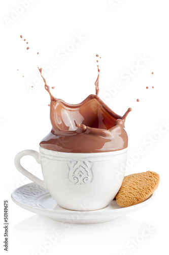 Photo: Splash of chocolate in white cup Splash of chocolate in white cup