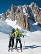 Skiers in front of the breathtaking view of Mont Blanc de Tacul