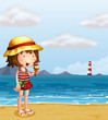A young girl eating an icecream at the seashore