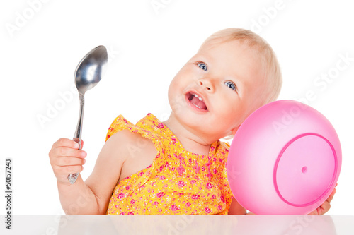 Photo: Little girl for a meal, isolated on white Little girl for a meal, isolated on white