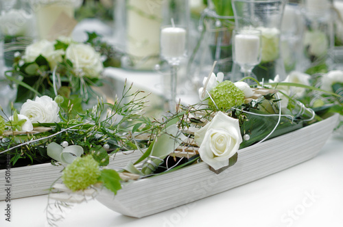 Photo: Blumendekorationauf dem Tisch Blumendekorationauf dem Tisch