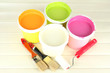 Set for painting: paint pots, brushes, paint-roller