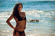 beautiful girl in a swimsuit on the sea