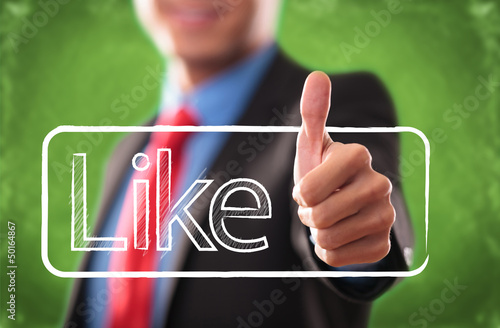 Photo: Hand with thumb up as like button Hand with thumb up as like button