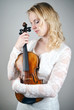 Photo: Violonist loves their instrument Violonist loves their instrument