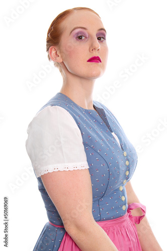 Photo: Selbstbewusstes Mädchen mit roten Haaren im Dirndl Selbstbewusstes Mädchen mit roten Haaren im Dirndl
