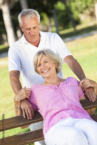 Photo: Happy Senior Couple Smiling Outside in Sunshine Happy Senior Couple Smiling Outside in Sunshine