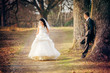 Wedding shot of bride and groom in park