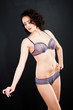 Foto: girl in lacy underwear on black background girl in lacy underwear on black background