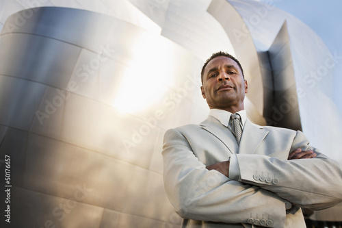 Photo: African American businessman with arms crossed African American businessman with arms crossed