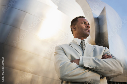 Photo: African American businessman with arms crossed African American businessman with arms crossed